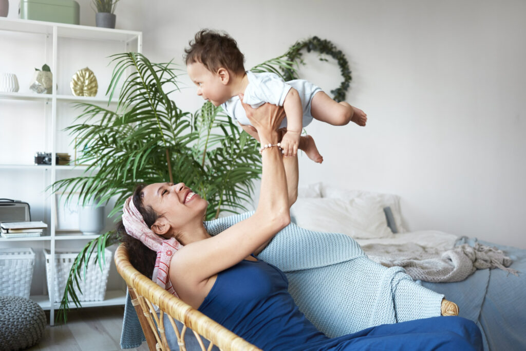 Professional caregiver assisting elderly patient at home in Dubai – home healthcare services