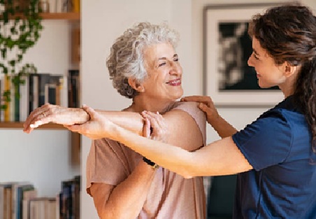 Licensed physiotherapist treating a patient in a modern clinic in Dubai