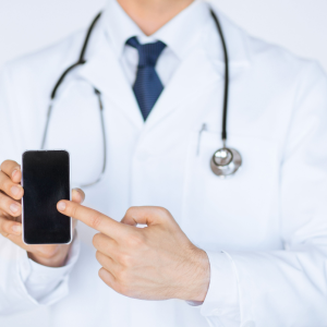 Professional doctor visiting a patient at home for on-call medical services.