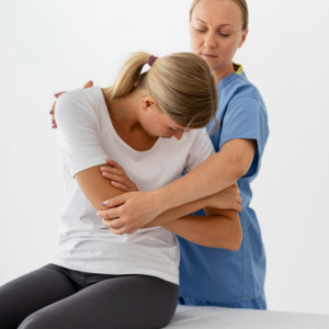 A physiotherapist assisting a patient with rehabilitation exercises in a modern clinic.
